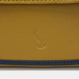 Bandolera in Leder und gelbem Berg