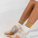 Zapatilla de mujer en naranja