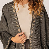 Poncho de mujer en negro