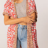 Kimono reversibile in cotone con stampa animalier rossa