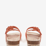 Flache Damen-Sandale aus Wildleder in Orange.
