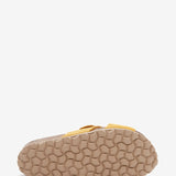 Sandalo basso da donna con fibbia color ambra