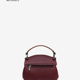 Bolso de mano pequeño en materiales reciclados burdeos