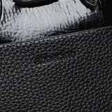 Schwarze Lackhandtasche