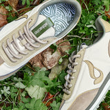 Zapatilla de mujer en beige