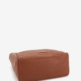Bolso hobo de piel trenzada en cognac