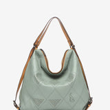 Bolso convertible en mochila de piel troquelada en verde