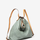 Bolso convertible en mochila de piel troquelada en verde