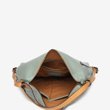 Bolso convertible en mochila de piel troquelada en verde