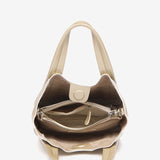 Bolso de mano pequeño de piel en dorado