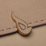Bolso de mano pequeño en materiales reciclados beige