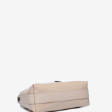 Small shoulder bag in beige patent leather