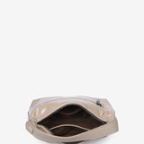 Small shoulder bag in beige patent leather