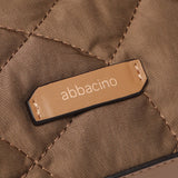 Gepolsterte Umhängetasche aus recycelten Materialien in Camel.