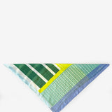 Grüne Bandana mit geometrischem Muster.