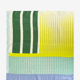 Grüne Bandana mit geometrischem Muster.