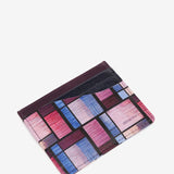 Tarjetero en piel con estampado geométrico multicolor