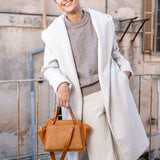 Kleiner Handtasche aus recycelten Materialien in Cognac.
