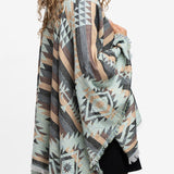 Poncho con estampado geométrico en beige