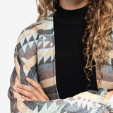Poncho con estampado geométrico en beige