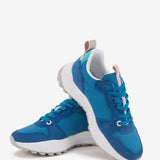 Zapatilla runner de mujer en azul