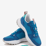 Zapatilla runner de mujer en azul