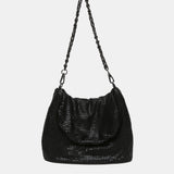 Bolso de hombro en malla metálica negra