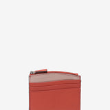 Tarjetero en piel coral