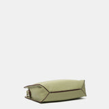 Bandolera en materiales reciclados verde