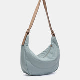Shoulder bag in recycled and padded materials, blue