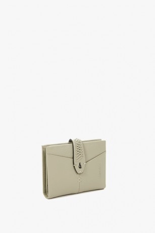 Women's green leather card...