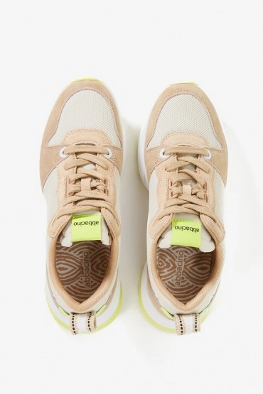 Women's runner style sneakers in beige
