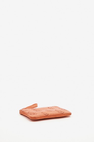 Women's coin purse in orange die-cut leather