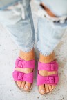 Woman\'s flat sandal in fuchsia suede