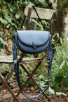 Blue half-moon crossbody bag in recycled materials