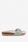 Woman\'s flat sandal with buckle in green