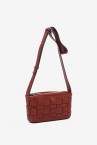 Crossbody bag in terracotta braided recycled materials