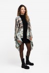 Poncho with geometric print in beige