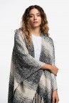 Poncho with striped print and black fringes