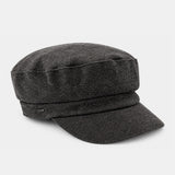 Schwarze bretonische Damenmütze.