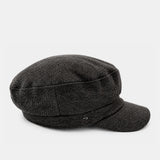 Schwarze bretonische Damenmütze.