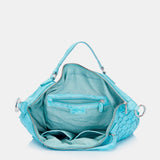 Bolso shopper de mujer de piel trenzada en turquesa