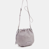 Women's bucket-style crossbody bag in lavender die-cut leather