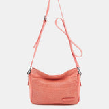 Bandolera de mujer en piel troquelada coral