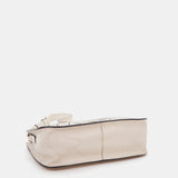 Beige Damen-Handtasche aus gestanztem Leder.