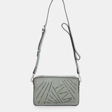 Mini borsa a tracolla da donna in pelle fustellata verde