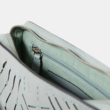 Mini borsa a tracolla da donna in pelle fustellata verde