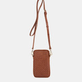 Braided leather mobile phone bag in cognac