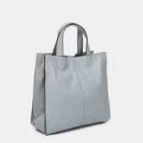 Shopper-Tasche aus grauem Leder.