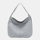 Shoulder bag in grey leather